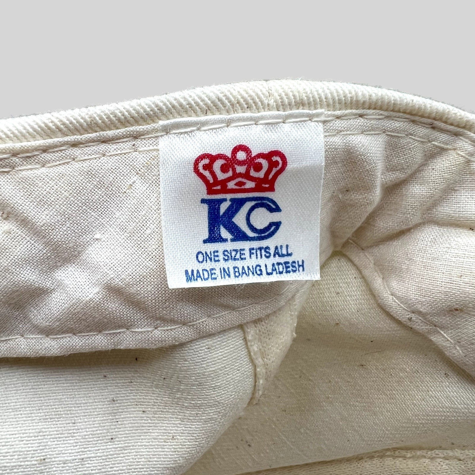 Raree Finds vintage KC brand snapback hat interior label with crown logo and size information