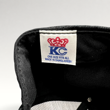 Raree Finds KC Headwear black snapback hat interior label showing crown logo and manufacturing details