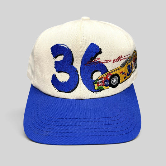 Raree Finds vintage 1990s Ken Schrader #36 NASCAR snapback hat with cream crown, royal blue brim, and racing embroidery.
