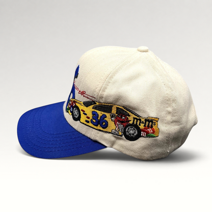 Raree Finds vintage Ken Schrader #36 NASCAR snapback hat with cream crown, royal blue brim, and M&M car embroidery.