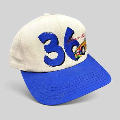 Raree Finds vintage Ken Schrader #36 NASCAR snapback hat with cream crown, royal blue brim, and racing embroidery.