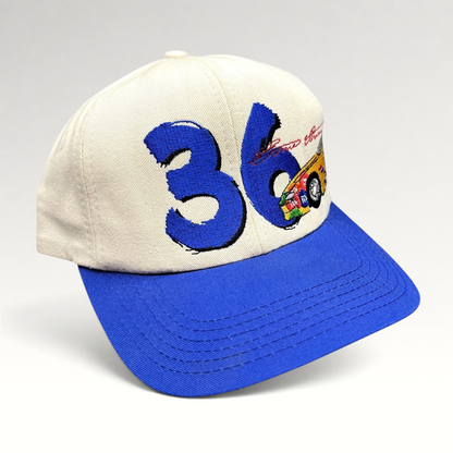 Raree Finds vintage Ken Schrader #36 NASCAR snapback hat with cream crown, royal blue brim, and racing embroidery.
