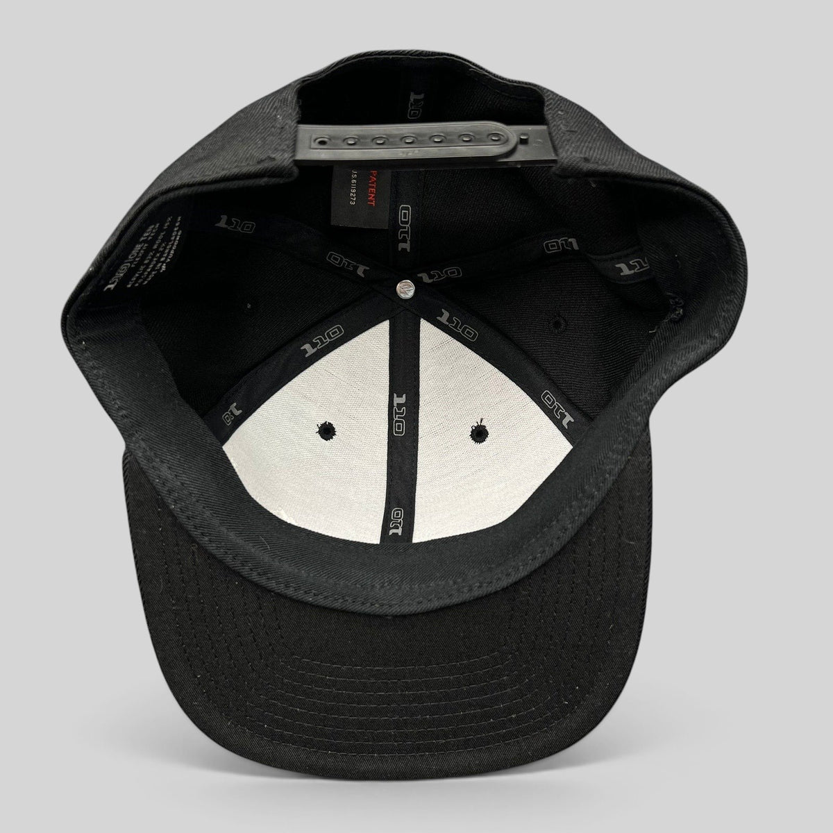 Raree Finds Kenichi Fishing Flexfit 110 snapback hat interior view showing branded taping and adjustable closure