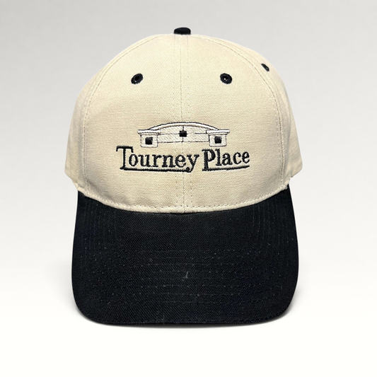 Raree Finds two-tone khaki and black cotton dad hat with embroidered Tourney Place clubhouse logo and curved brim.