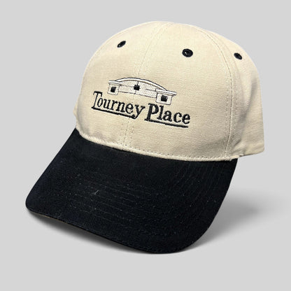 Raree Finds two-tone khaki and black cotton dad hat with embroidered Tourney Place clubhouse logo and curved brim