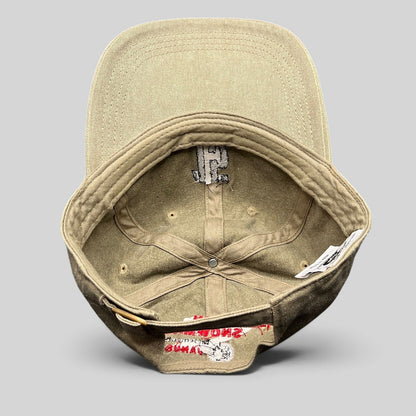 Raree Finds khaki garment-washed cotton dad hat showing interior Jazz Aspen Snowmass and Janus festival branding