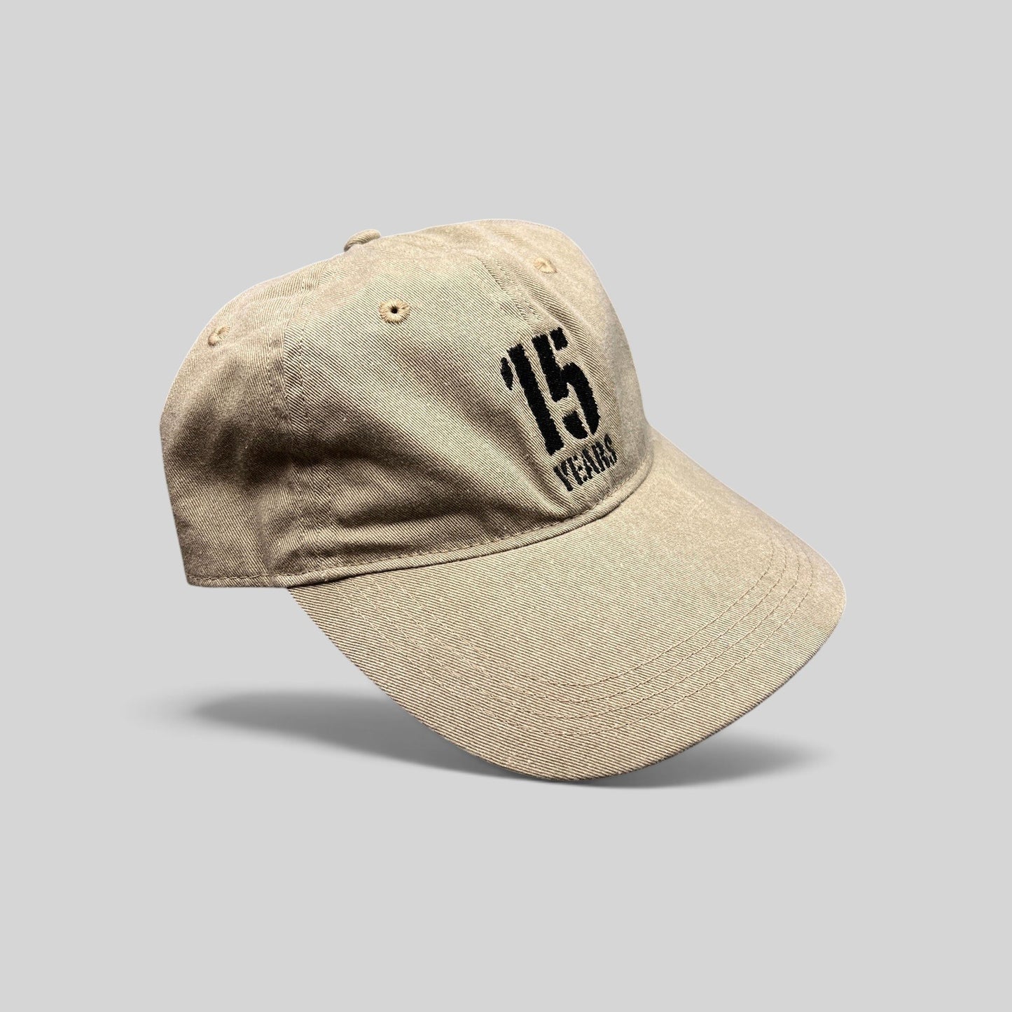 Raree Finds khaki garment-washed cotton dad hat with 15 Years embroidered graphic and curved brim