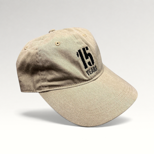 Raree Finds khaki garment-washed cotton dad hat with 15 Years embroidered graphic and curved brim