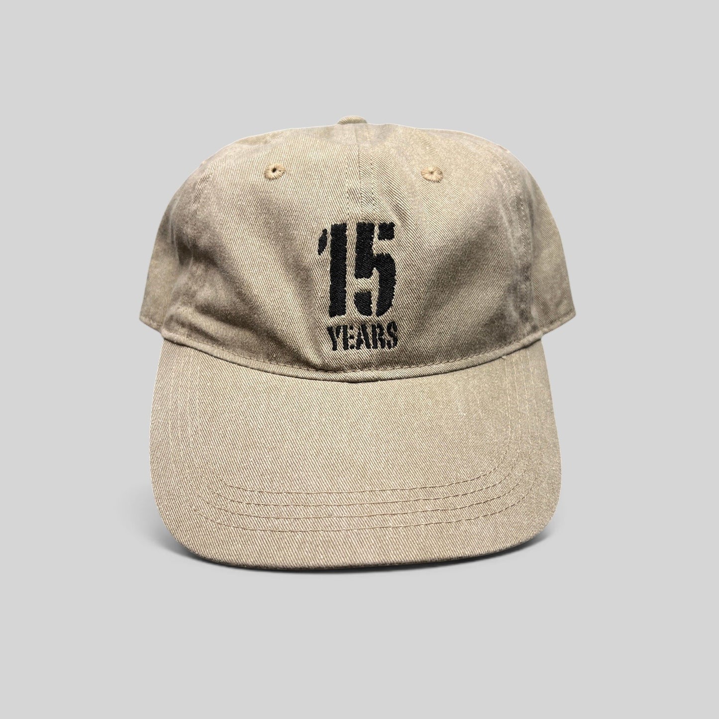 Raree Finds khaki garment-washed cotton dad hat with 15 Years embroidered graphic and curved brim