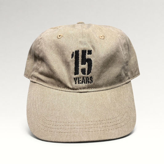 Raree Finds khaki garment-washed cotton dad hat with 15 Years embroidered graphic and curved brim