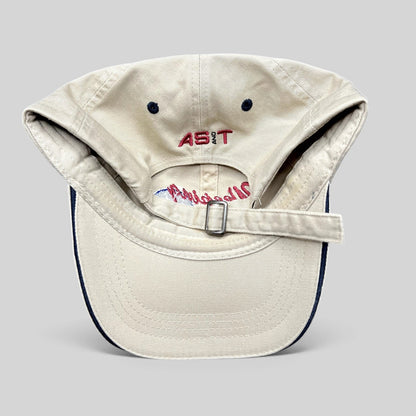 Raree Finds vintage khaki cotton strapback hat with AS&T embroidery on the back and adjustable metal buckle closure.