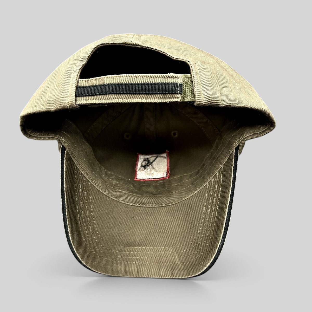 Raree Finds khaki cotton twill strapback hat with adjustable closure and interior branding label