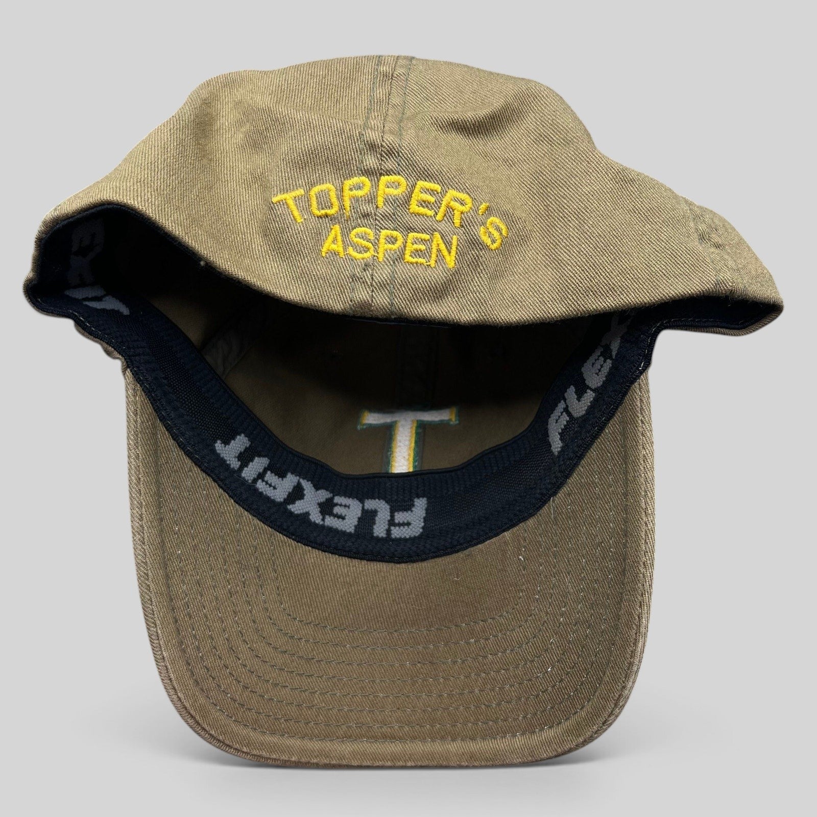 Raree Finds khaki cotton twill Flexfit cap with yellow Topper's Aspen embroidery on the interior brim