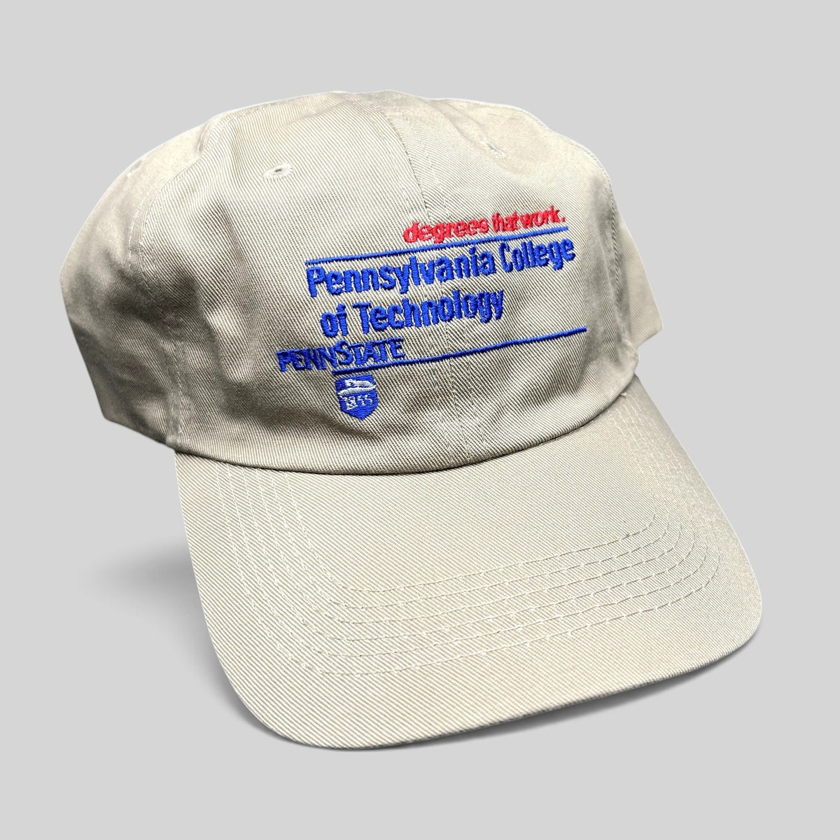 Raree Finds vintage khaki strapback hat with blue and red Pennsylvania College of Technology embroidery