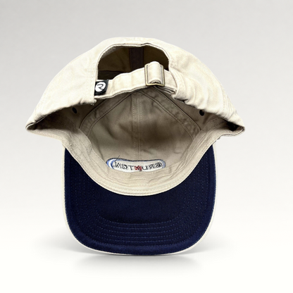 Raree Finds vintage khaki Richardson strapback hat with navy underbrim and adjustable fabric strap closure