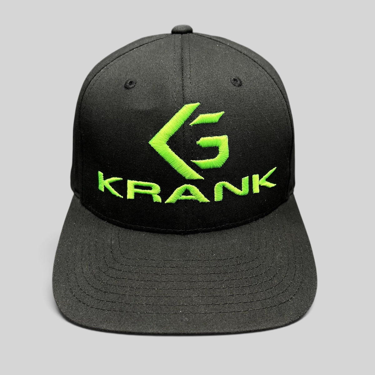 Raree Finds black Krank Golf Flexfit cap with bright green embroidered logo on the front structured crown