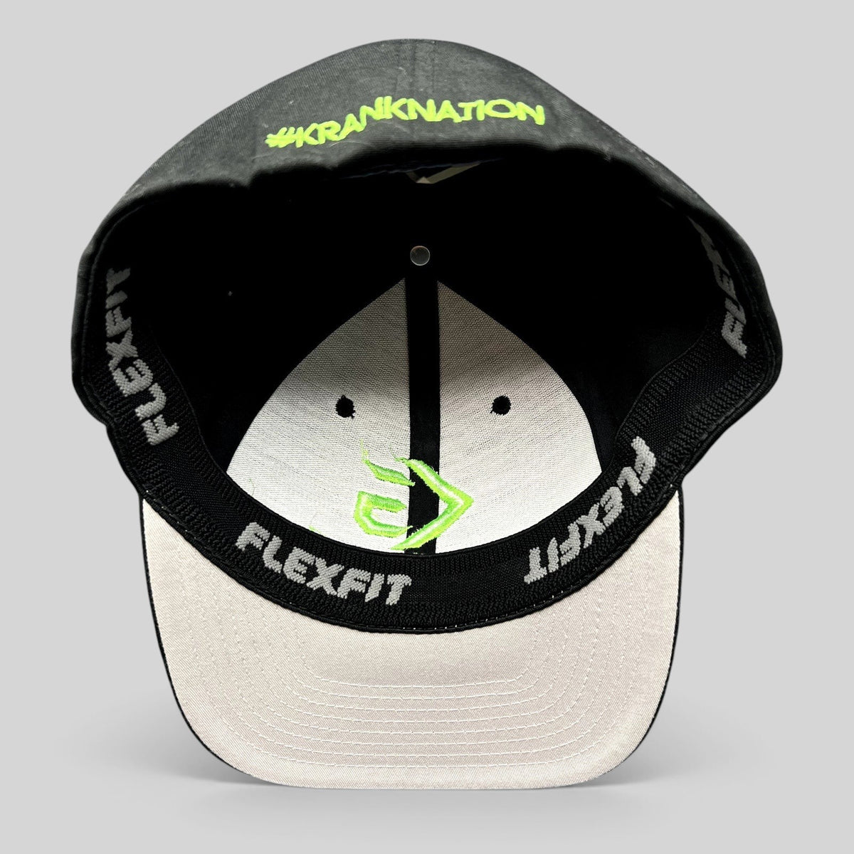 Raree Finds black and green Krank Golf Flexfit hat showing interior branding and #KrankNation embroidery