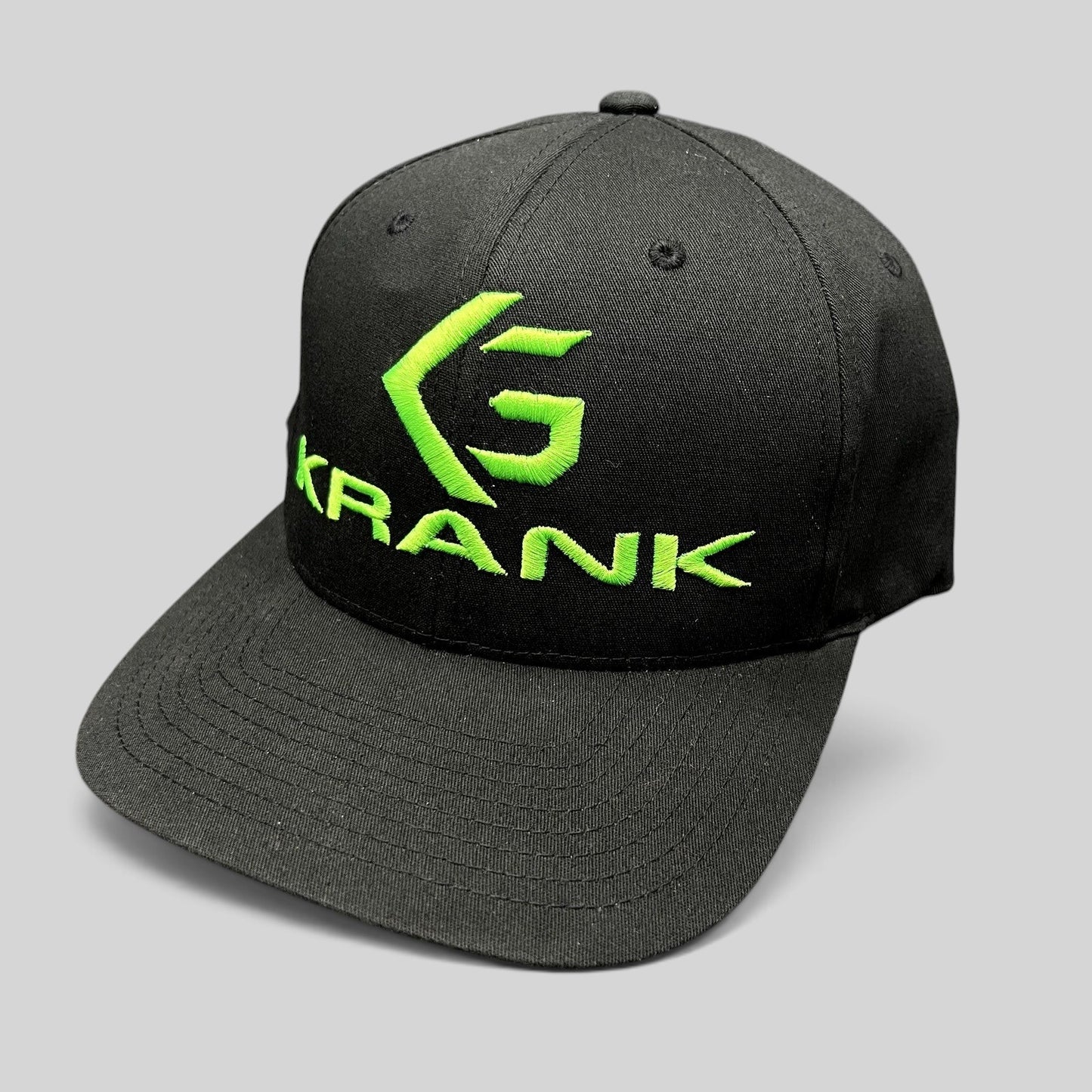 Raree Finds black Krank Golf Flexfit cap with bright green embroidered logo on the front