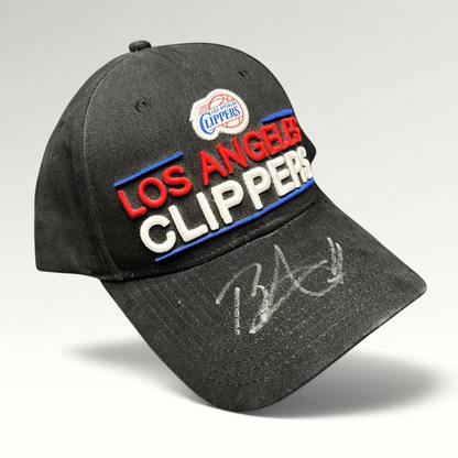 Raree Finds vintage LA Clippers strapback hat in black cotton with embroidered team logo and unidentified autograph.