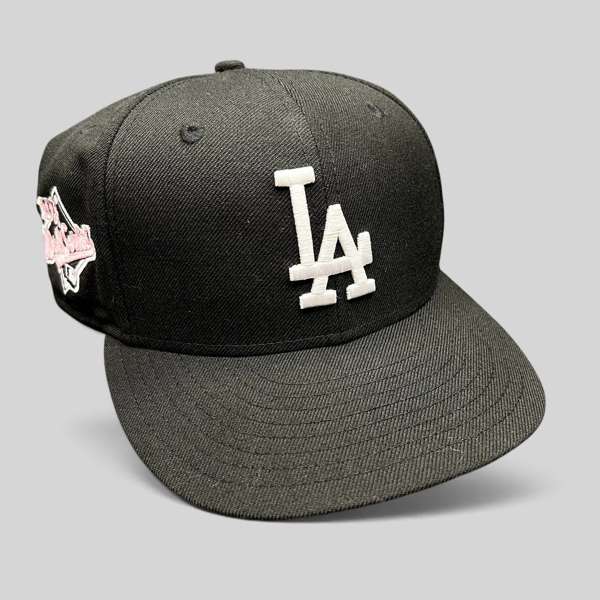 Raree Finds New Era LA Dodgers 59FIFTY fitted hat in black wool with white embroidered LA logo and side patch