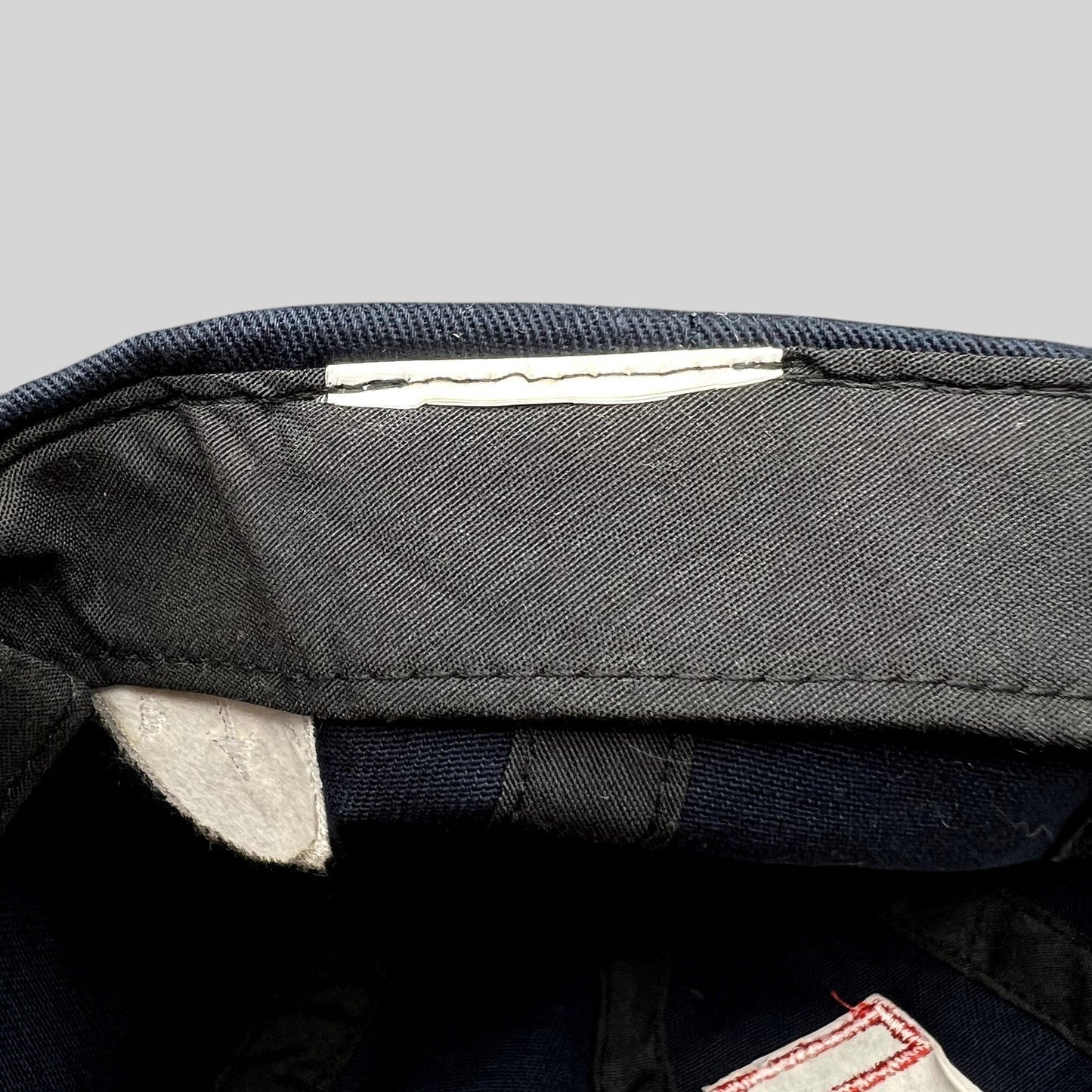 Raree Finds vintage La Martina navy blue cotton strapback hat interior showing brand tag and construction details