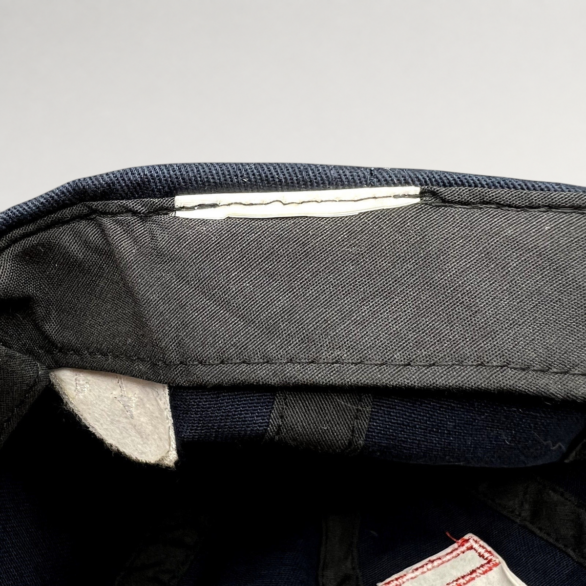 Raree Finds vintage La Martina navy blue cotton strapback hat interior showing brand tag and construction details