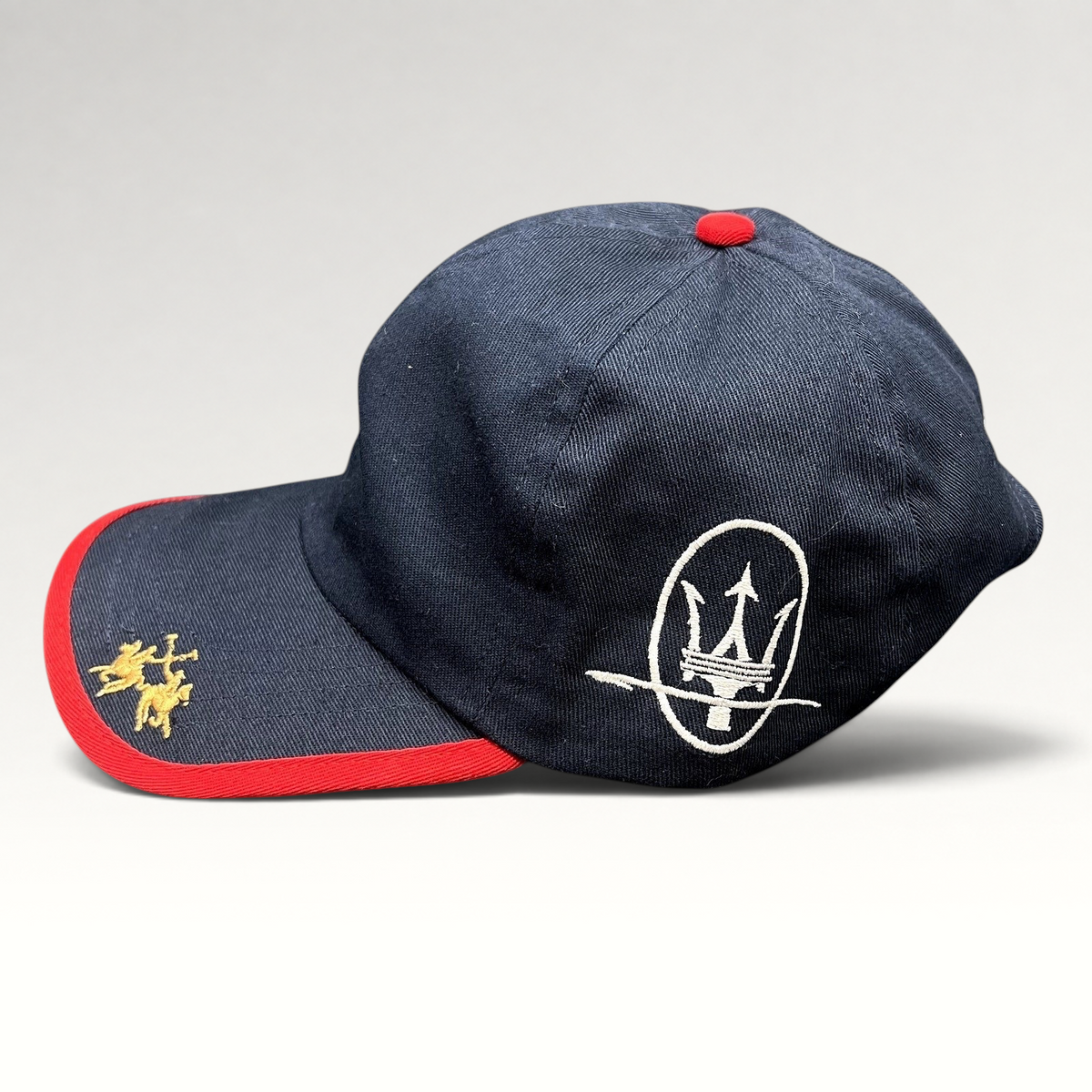 Raree Finds vintage La Martina navy blue cotton strapback hat with Maserati trident logo and red brim piping