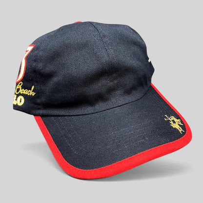 Raree Finds vintage La Martina navy blue cotton strapback hat with red brim piping and Miami Beach Polo embroidery.