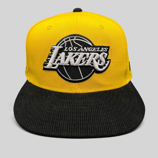 Raree Finds Los Angeles Lakers 9FIFTY snapback hat with a gold crown and black corduroy brim featuring team embroidery.