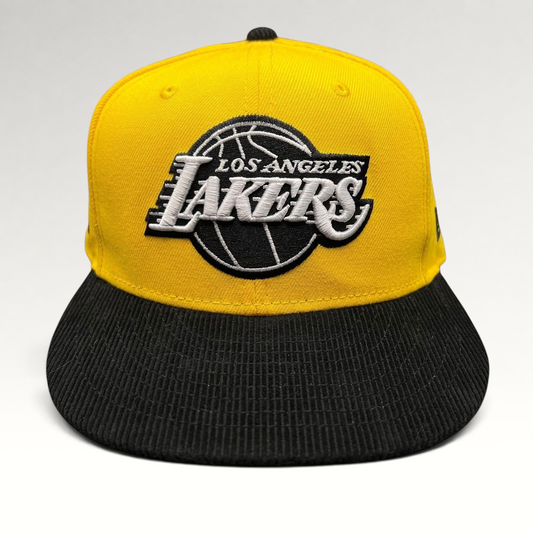 Raree Finds Los Angeles Lakers 9FIFTY snapback hat with a gold crown and black corduroy brim featuring team embroidery.