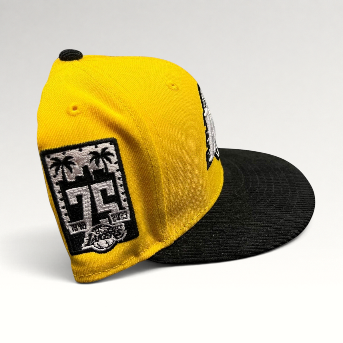 Raree Finds Los Angeles Lakers 75th anniversary snapback hat with a gold crown and black corduroy brim