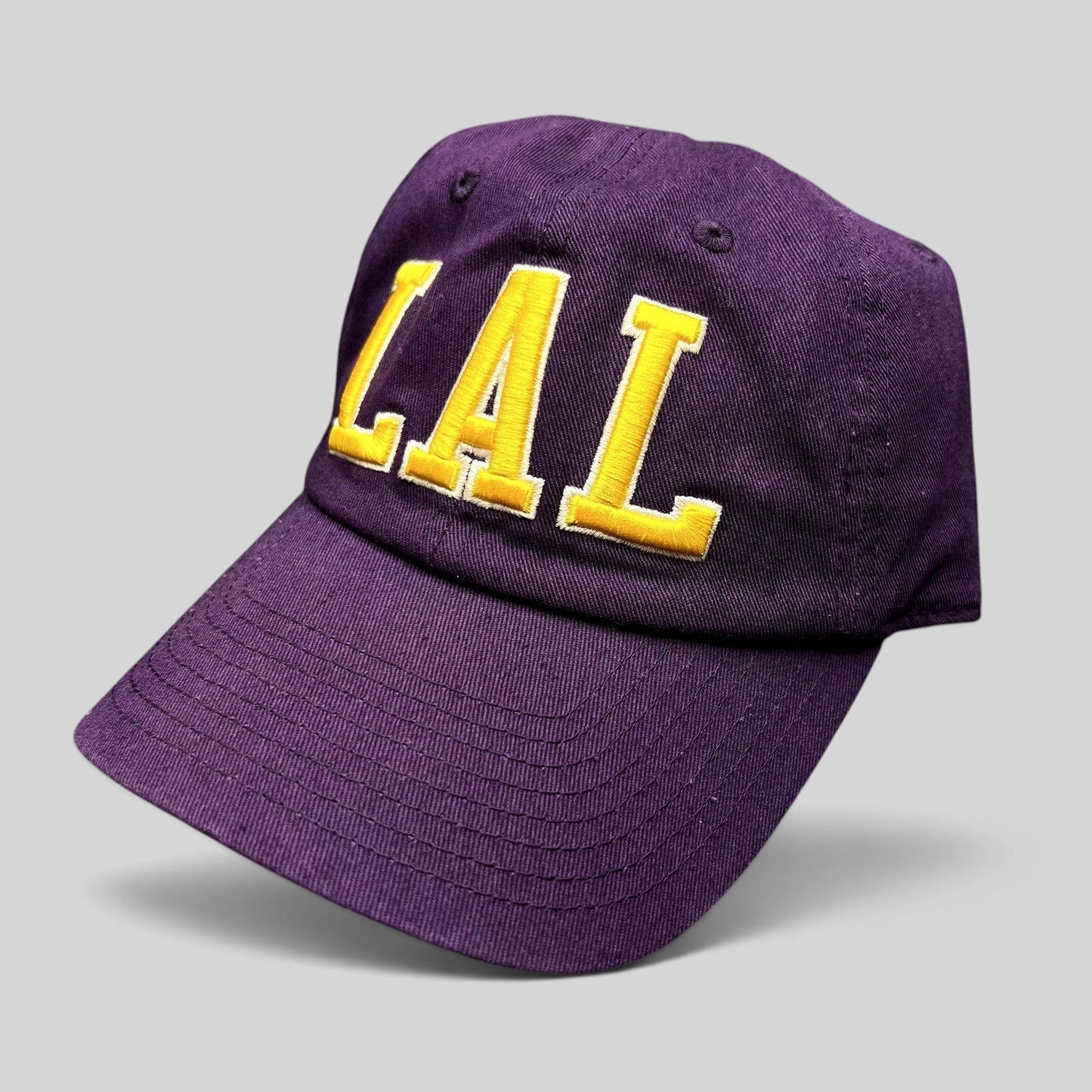 Raree Finds purple Los Angeles Lakers LAL strapback hat with yellow tackle twill embroidery on a cotton cap