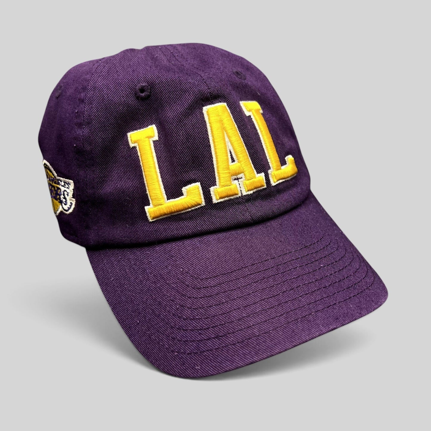 Raree Finds purple Los Angeles Lakers LAL strapback hat with yellow tackle twill embroidery and side logo detail
