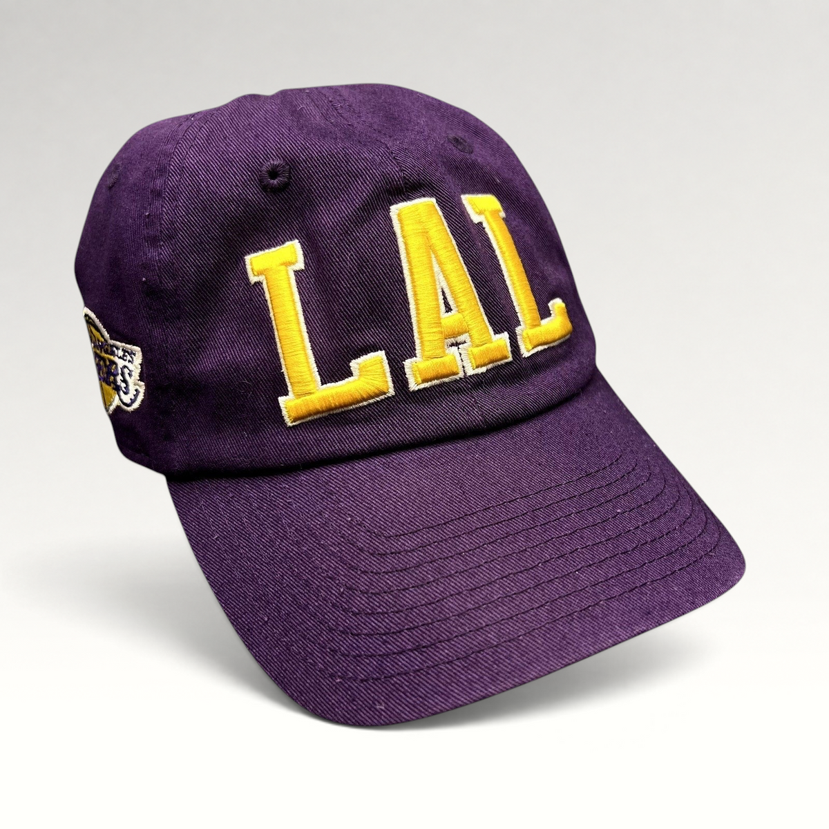 Raree Finds purple Los Angeles Lakers LAL strapback hat with yellow tackle twill embroidery and side logo detail