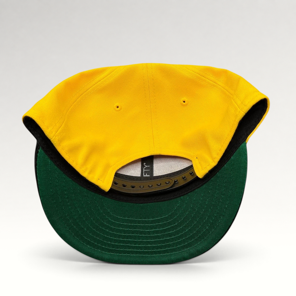 Raree Finds Los Angeles Lakers 9FIFTY snapback hat showing the gold crown, black corduroy brim, and green undervisor.