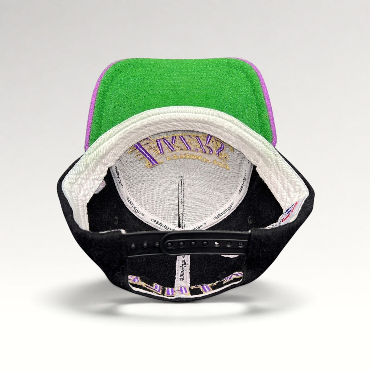Raree Finds Kill the Hype Lakers snapback hat showing interior branding, green underbrim, and adjustable strap.