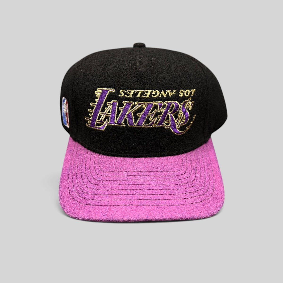 Raree Finds Kill the Hype Los Angeles Lakers snapback hat with black wool crown, purple felt brim, and gold logo.