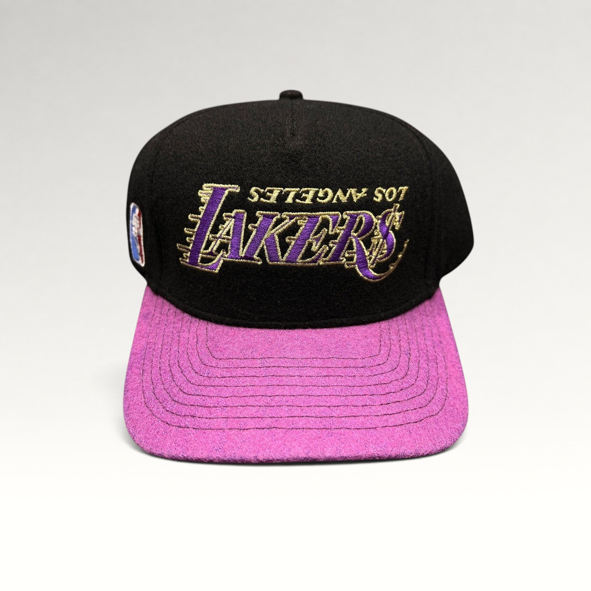 Raree Finds Kill the Hype Los Angeles Lakers snapback hat with black wool crown, purple felt brim, and gold logo.