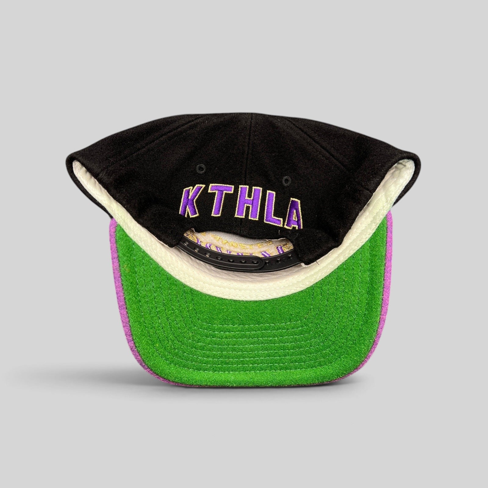 Raree Finds Kill the Hype x Los Angeles Lakers wool snapback hat featuring a black crown and green underbrim.