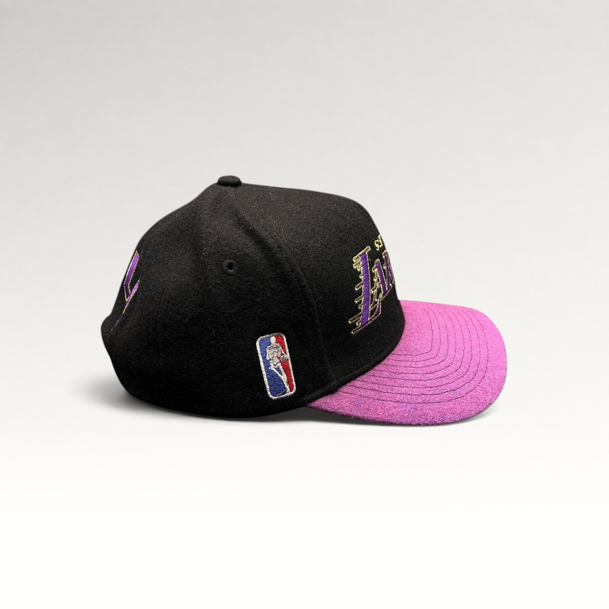 Raree Finds Kill the Hype Los Angeles Lakers snapback hat with black wool crown, purple felt brim, and NBA logo patch.