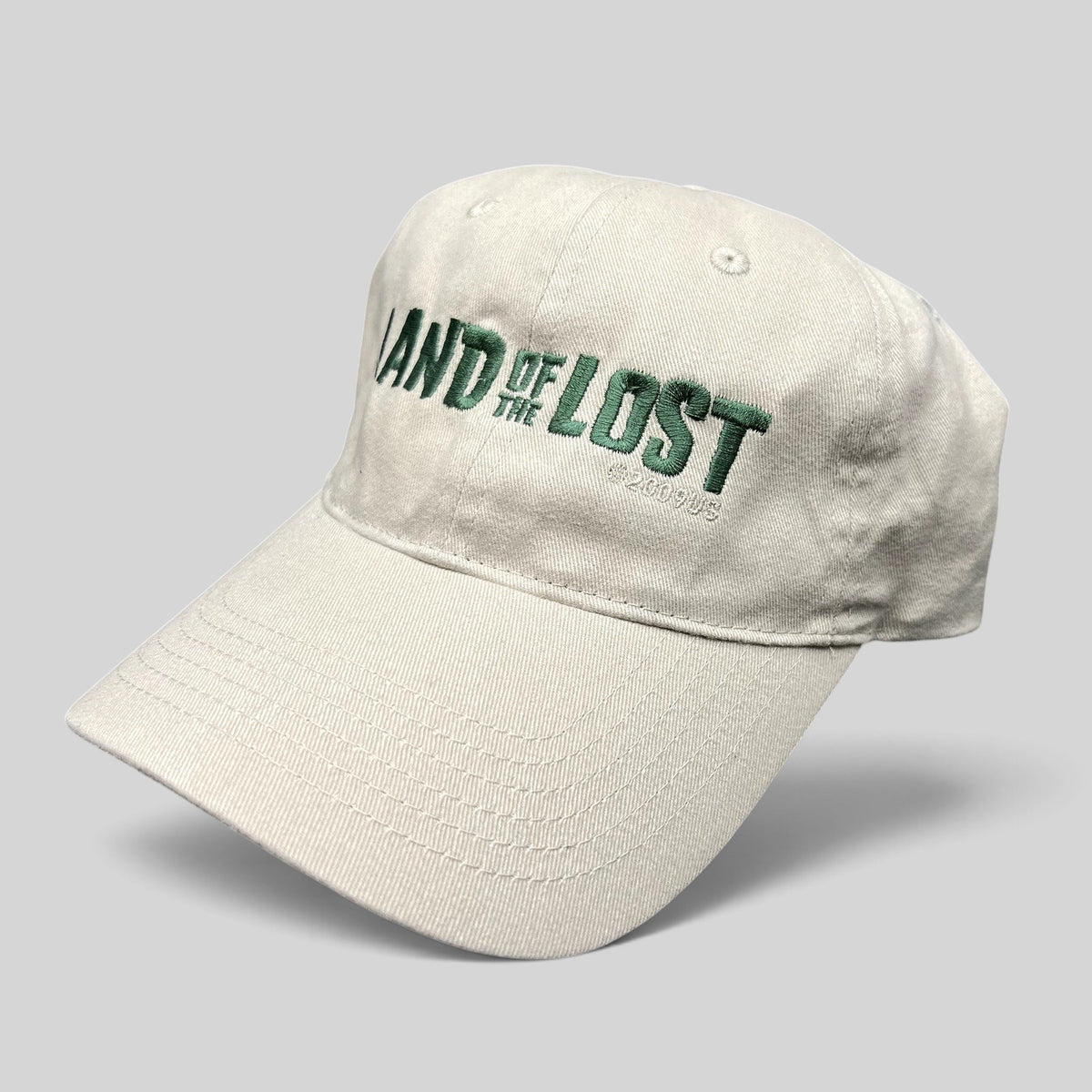 Raree Finds Land of the Lost 2009 movie promo strapback hat in off-white cotton with green embroidered lettering.
