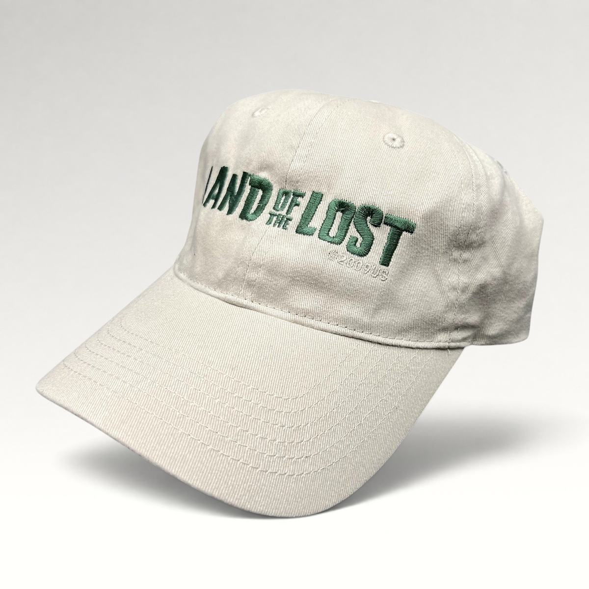 Raree Finds Land of the Lost 2009 movie promo strapback hat in off-white cotton with green embroidered lettering.