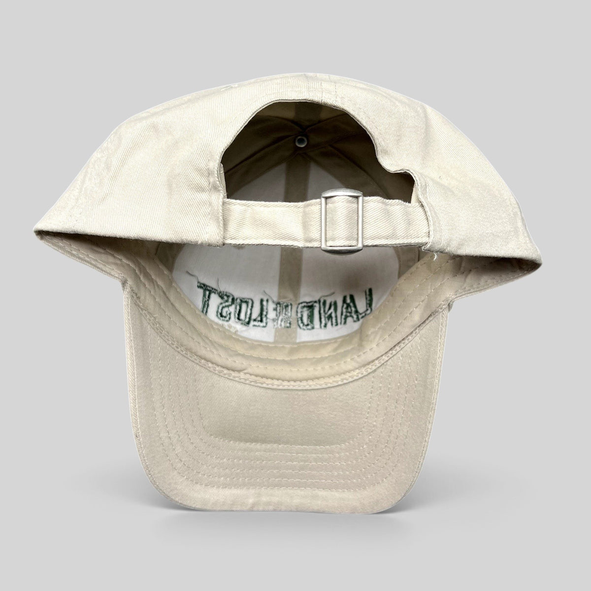 Raree Finds Land of the Lost 2009 movie promo strapback hat in off-white cotton with green embroidered lettering