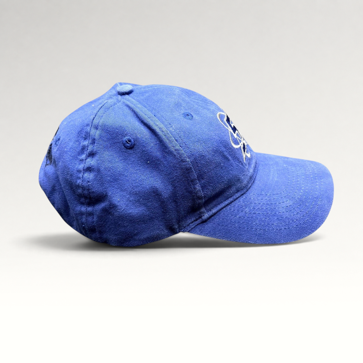 Raree Finds royal blue Las Vegas 51s MiLB strapback hat with atomic logo embroidery and side profile view
