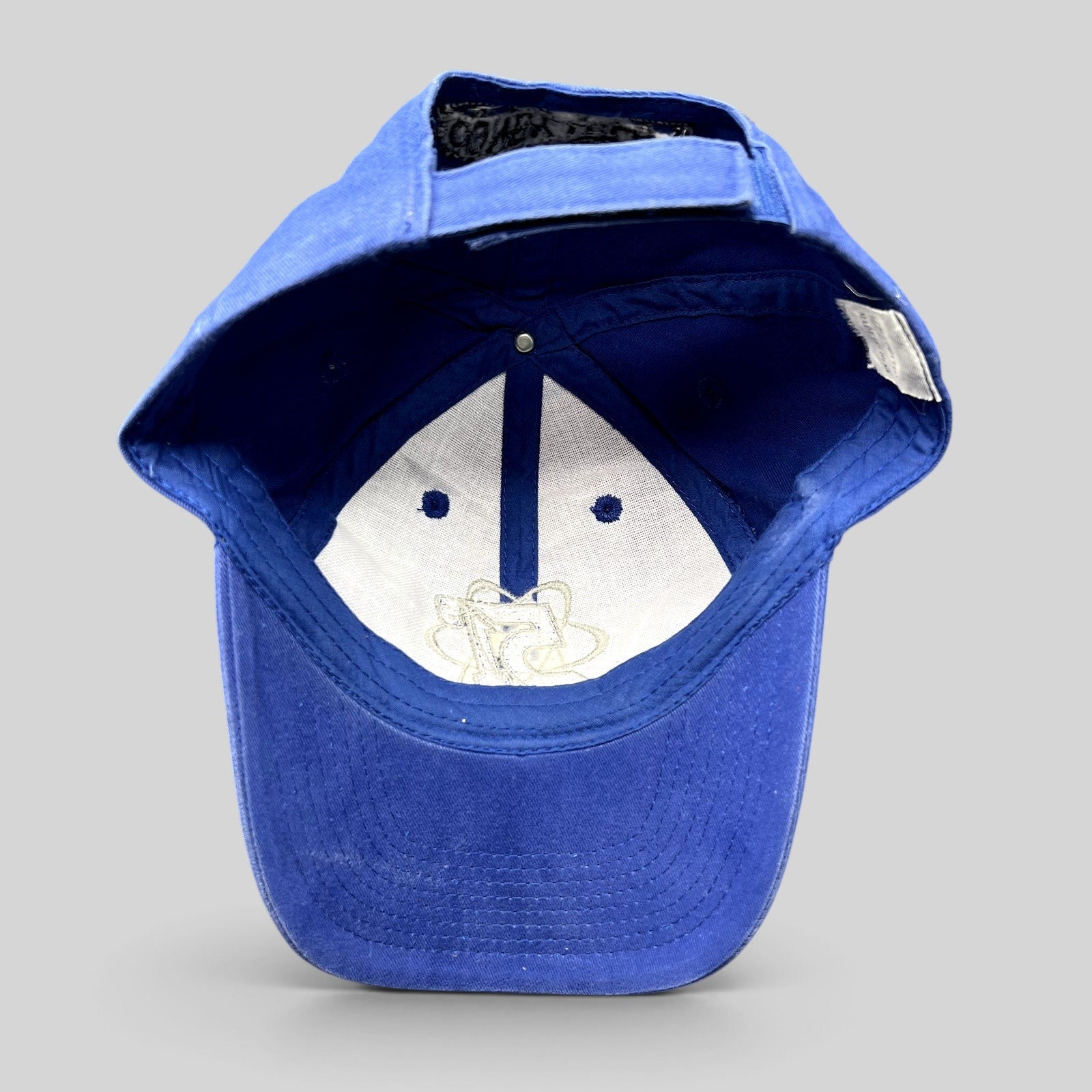 Raree Finds royal blue Las Vegas 51s strapback hat showing the interior lining and embroidered atomic logo
