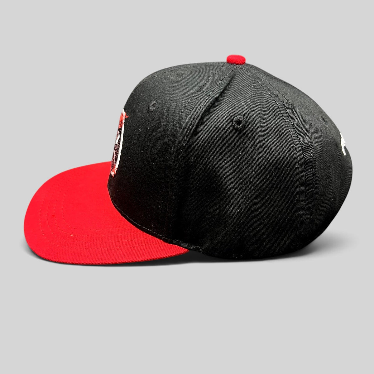 Raree Finds LawBreakers black and red snapback hat with embroidered distressed smiley logo and flat bill