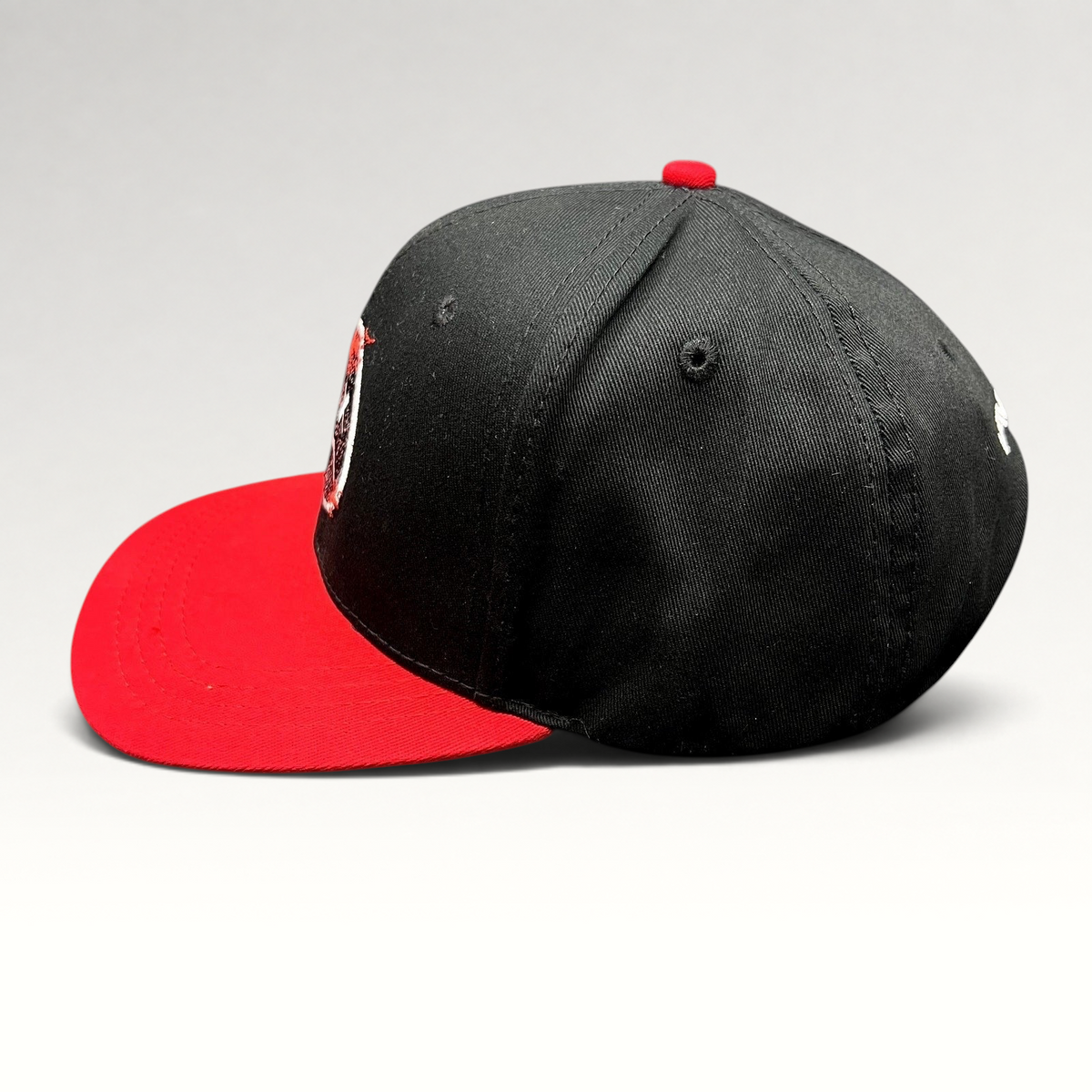 Raree Finds LawBreakers black and red snapback hat with embroidered distressed smiley logo and flat bill