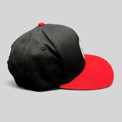 Raree Finds LawBreakers black and red snapback hat with embroidered distressed smiley logo and flat bill