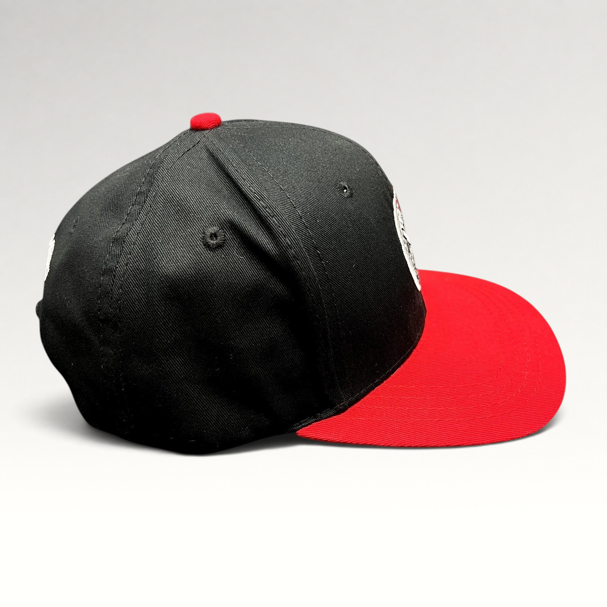 Raree Finds LawBreakers black and red snapback hat with embroidered distressed smiley logo and flat bill