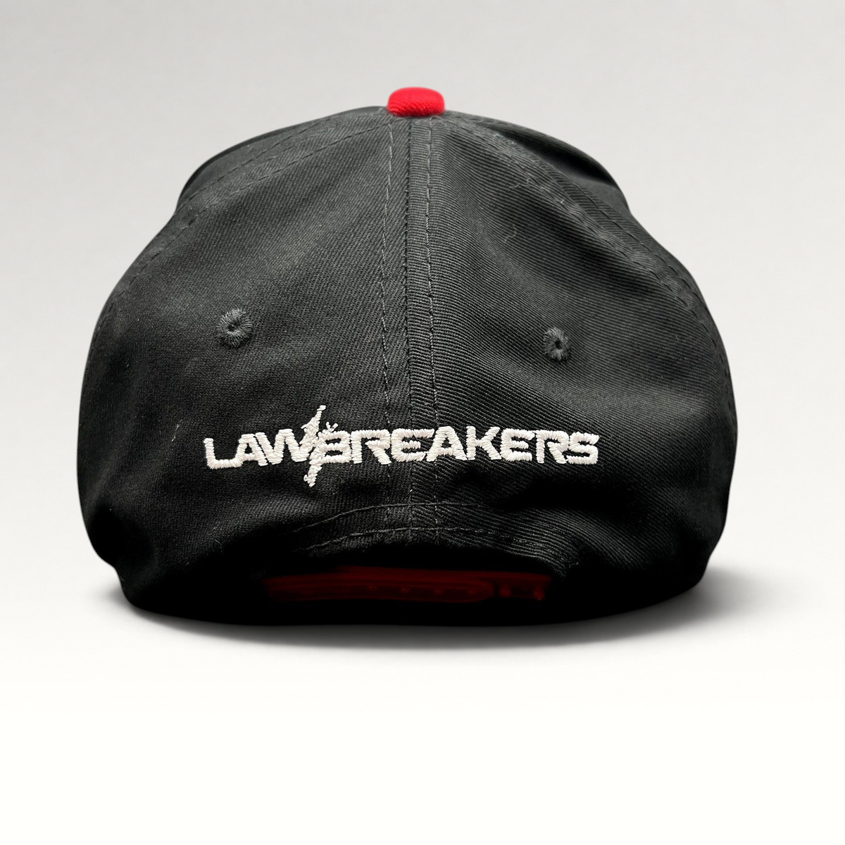 Raree Finds LawBreakers black and red snapback hat with white embroidered logo on the back
